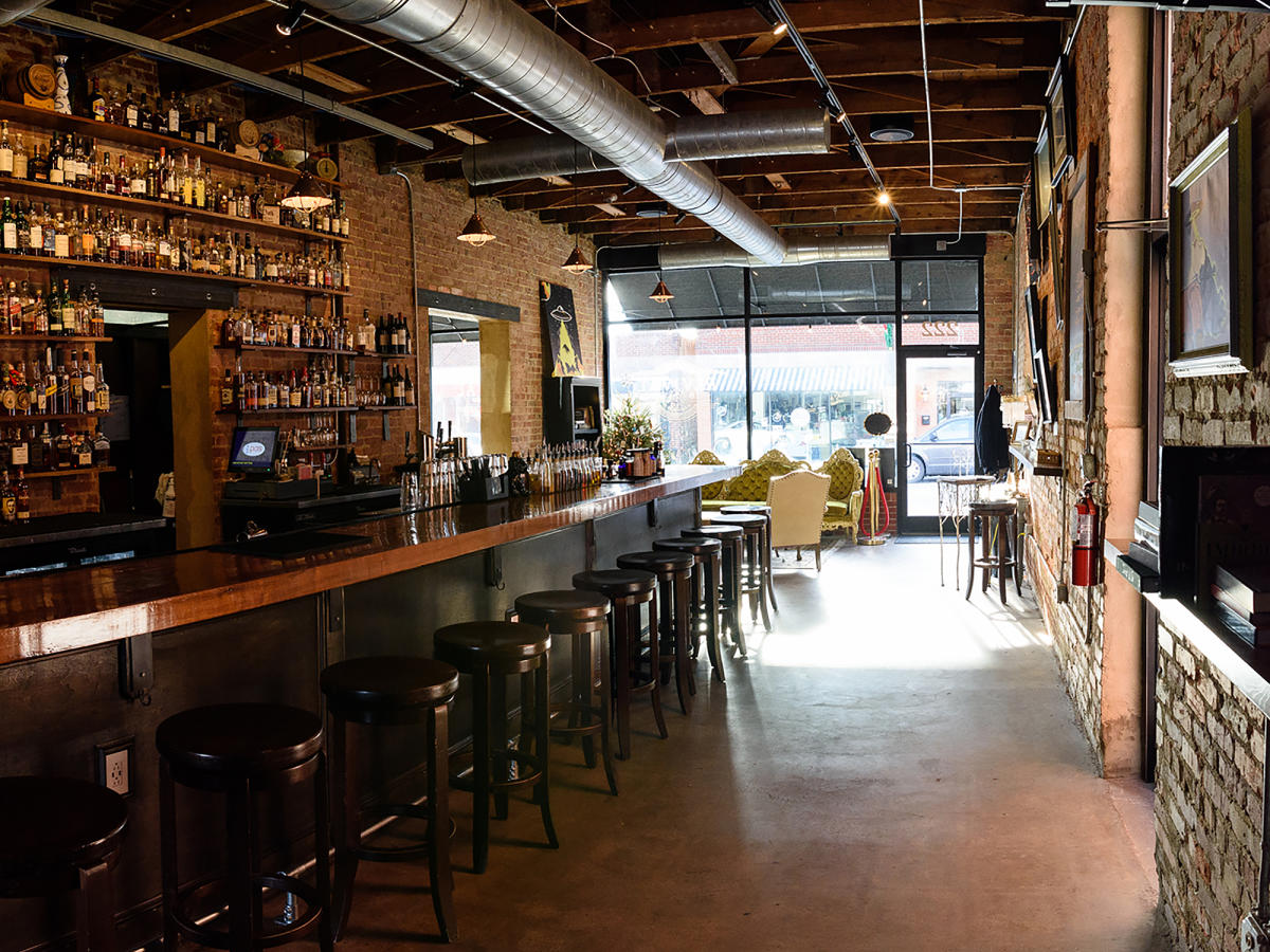 Bar full of Whiskey at Revival 1869 Drinkery in Clayton, NC.