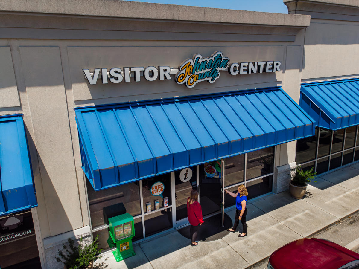 Drone shot of visitors entering the Johnston County Visitors Center.