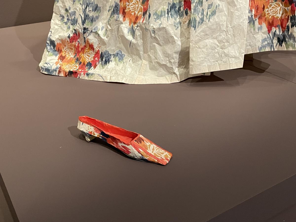 A paper slipper on display at the Wichita Art Museum