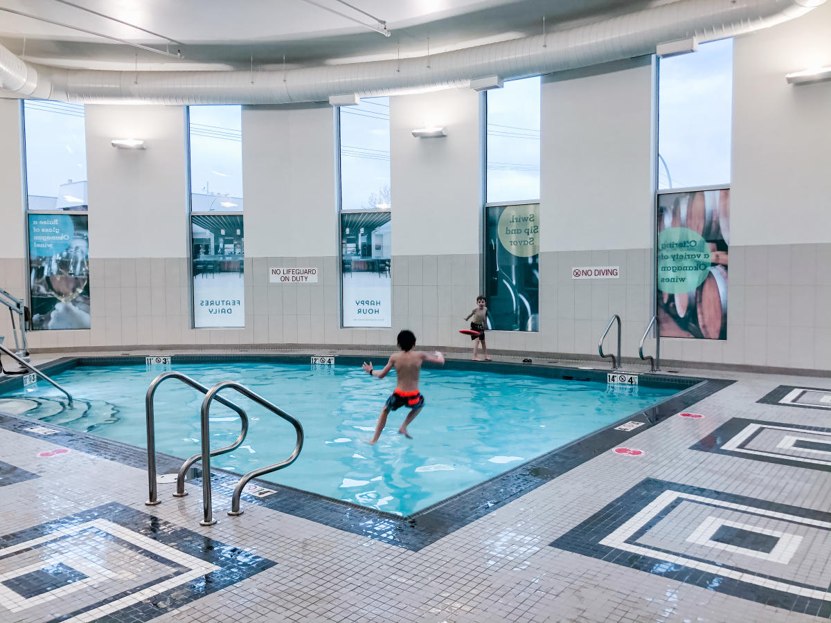 Kids playing in the pool at Hyatt Kelowna