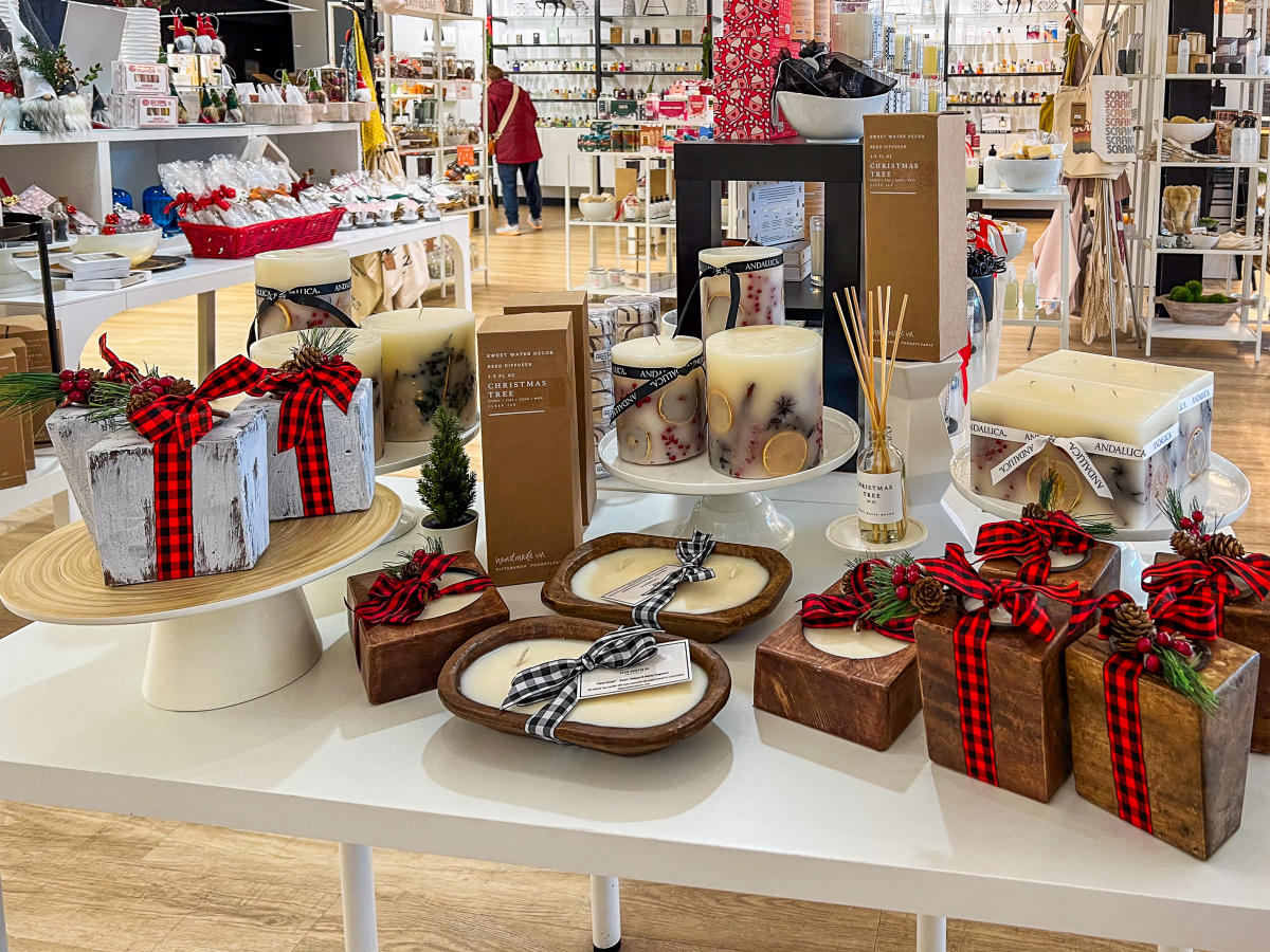 Candles and other merchandise with holiday decorations at Noteology in Scranton