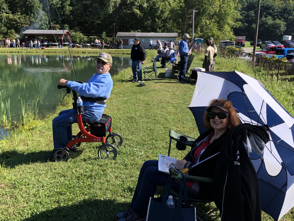 Veteran Paul Adams and his wife, Chris, relaxing during the fifth annual Forbes Trail Trout Unlimited fishing event for military veterans and first responders.