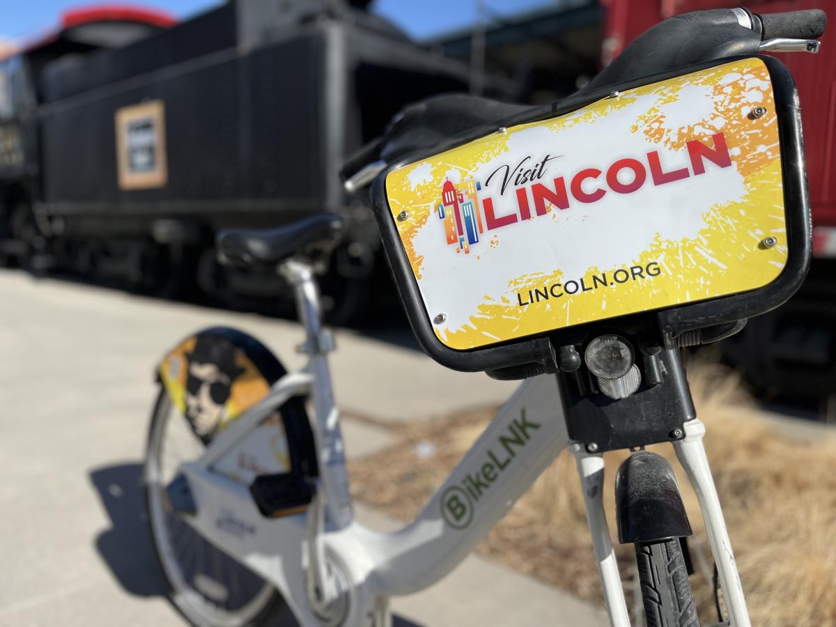 Visit lincoln bike in front of haymarket train