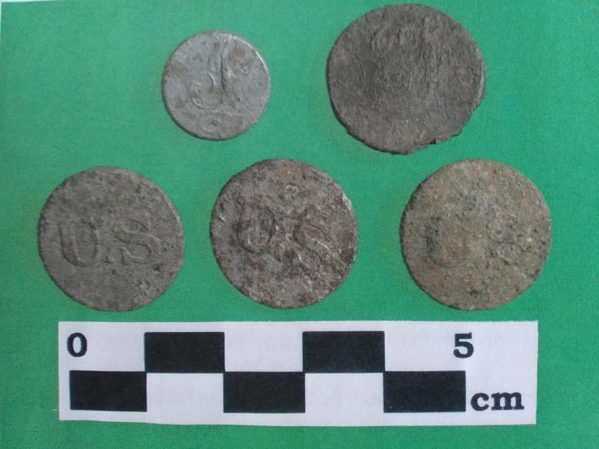 Buttons recovered during an archaeological dig at the site of the 1814 Battle of Mackinac Island