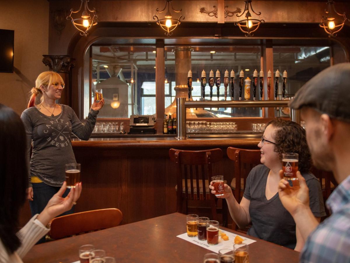 People enjoy having a beer tasting at Capital Brewery