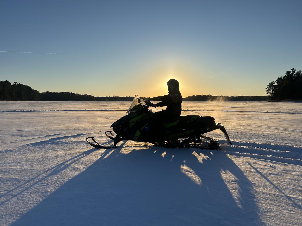 snowmobile_sunset_lake