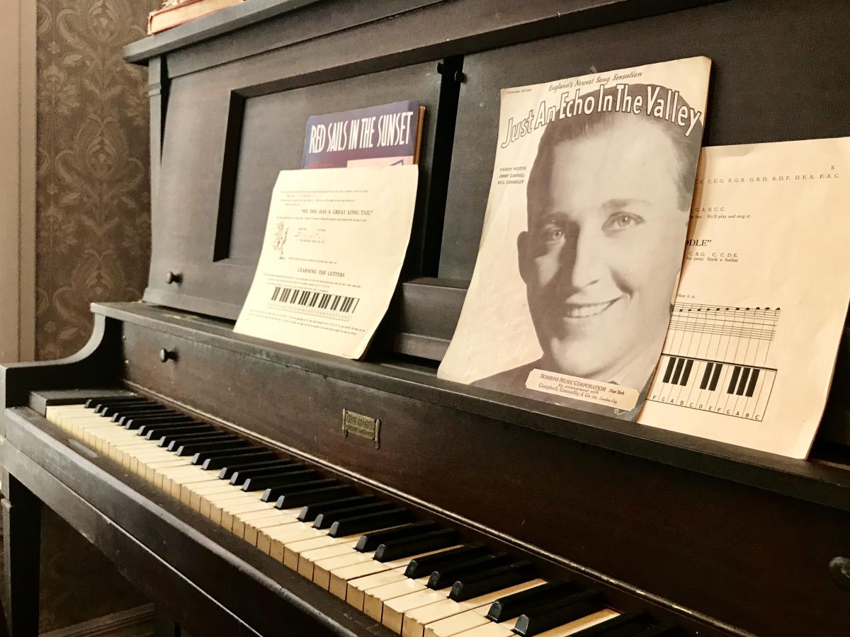 Piano at the Scolnik House of the Depression Era with sheet music, one features image of Bing Crosby