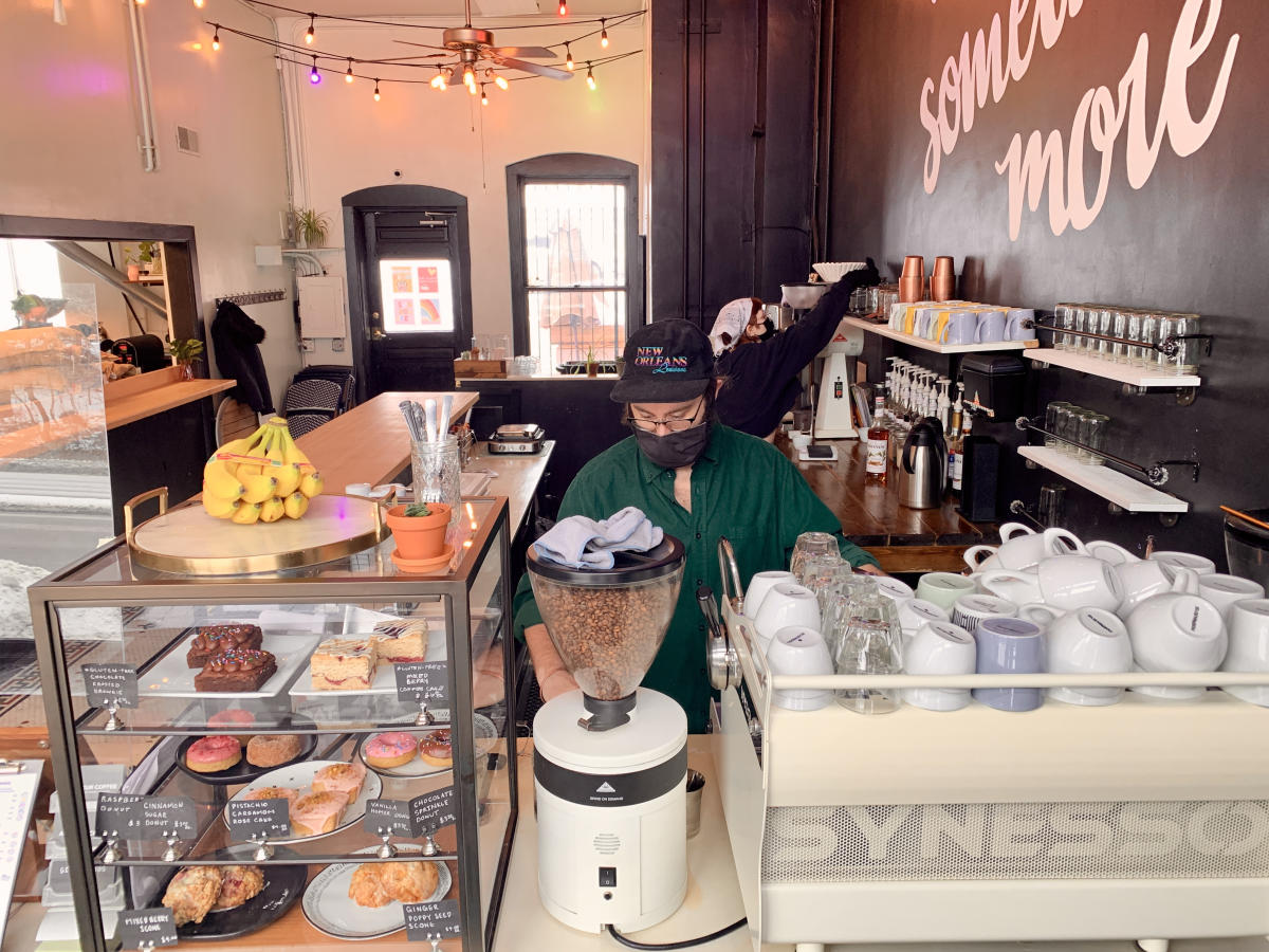 Man In A Mask Working At Amateur Coffee in Omaha, NE