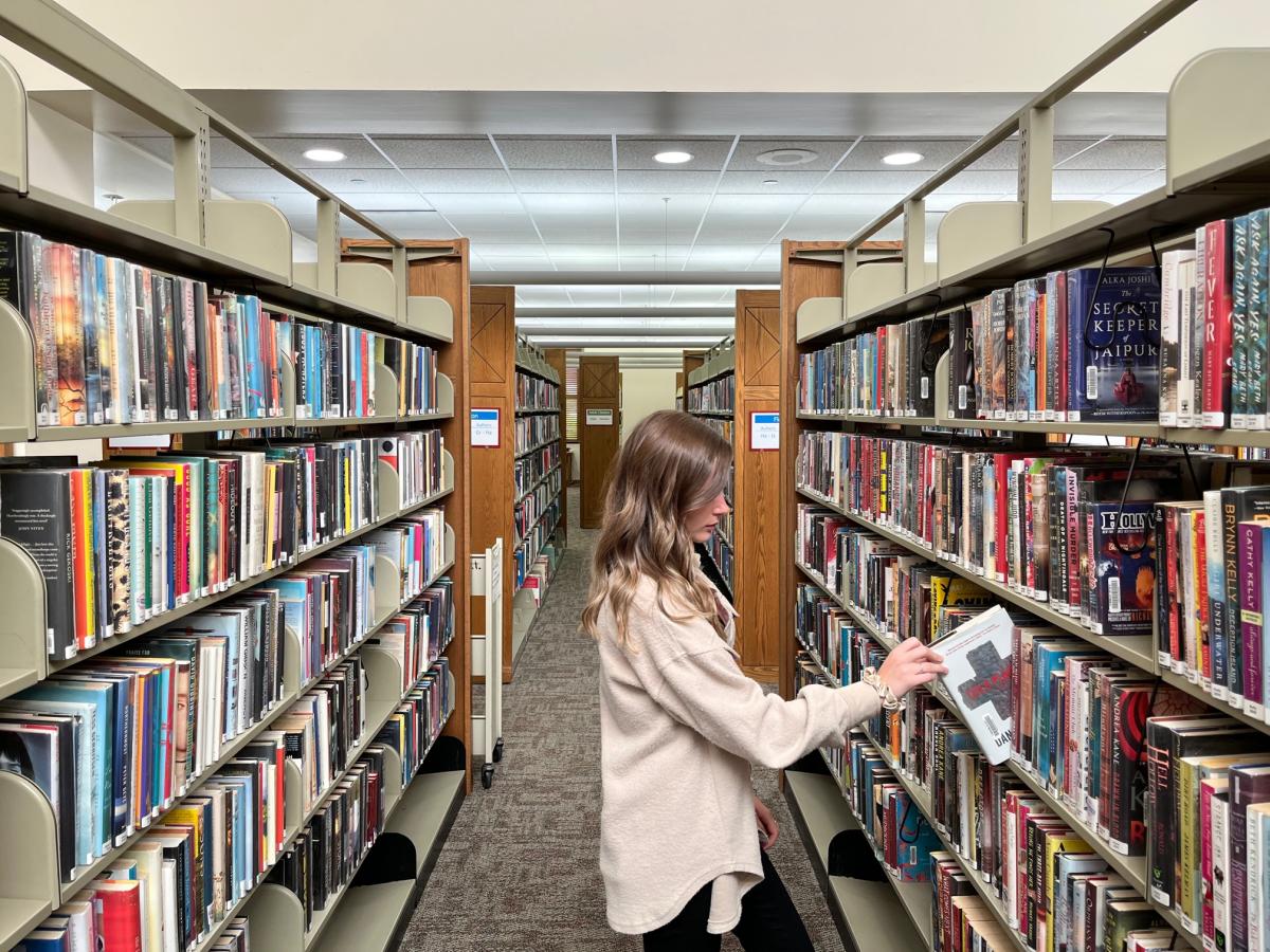 Checking out books at the Oshkosh Public Library