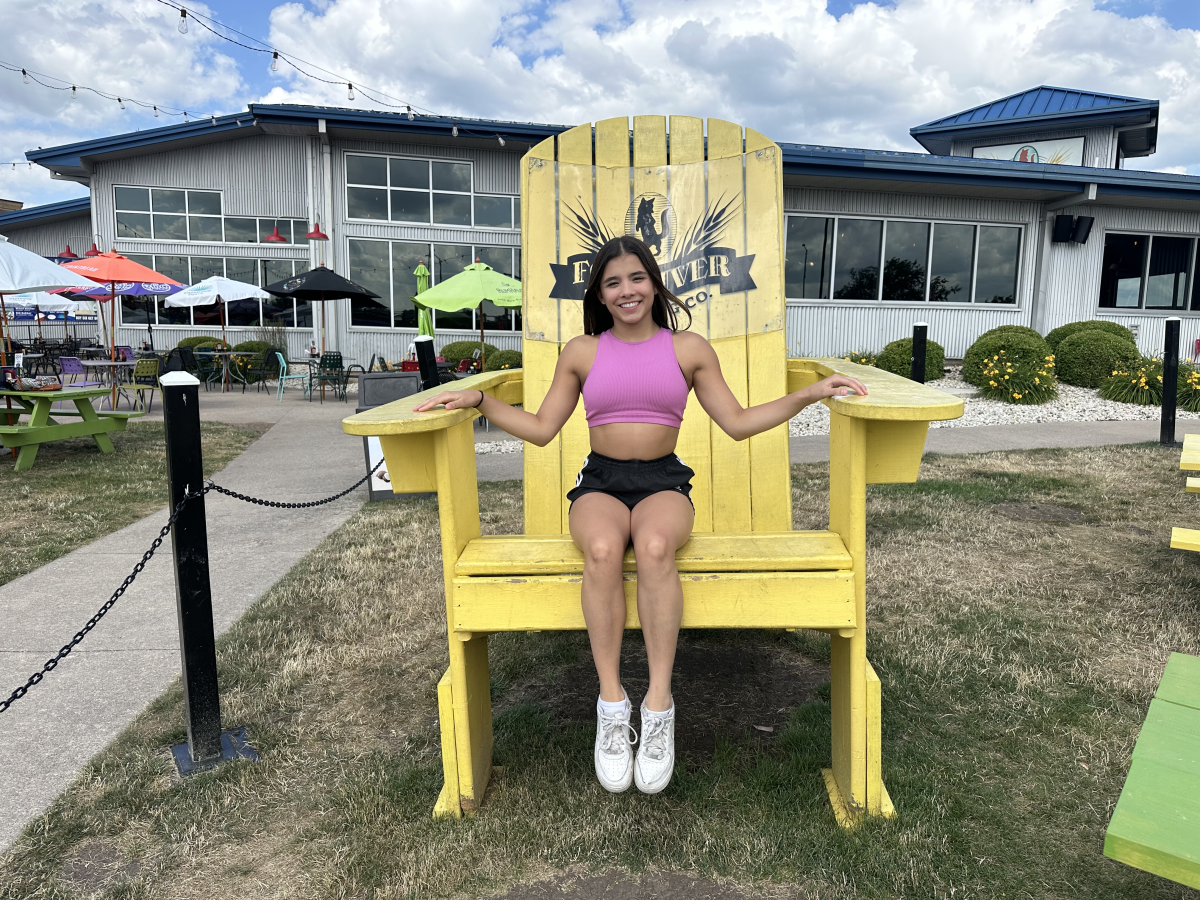 Chloe on Fox River Brewing Company Big Yellow Chair