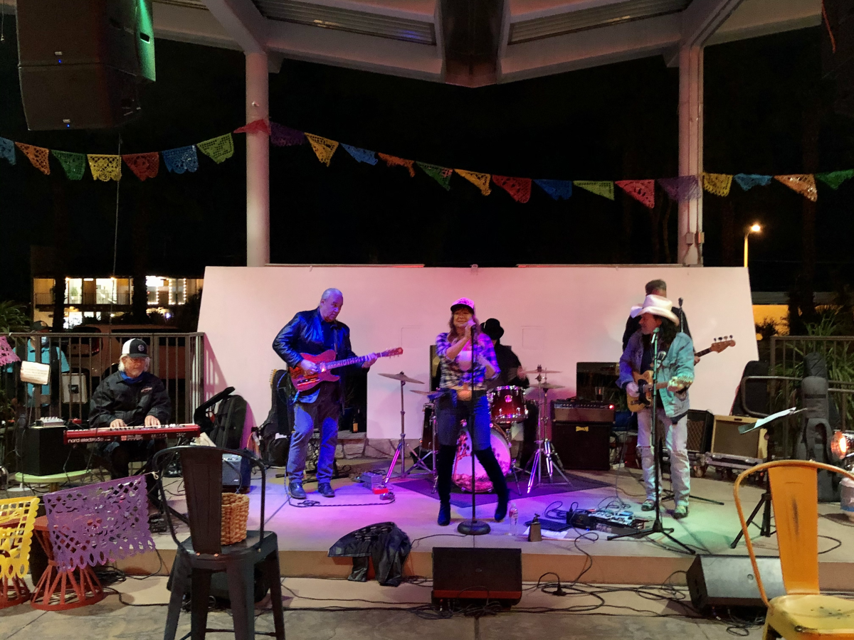 A band performs on the outdoor stage at Casuelas Cafe.