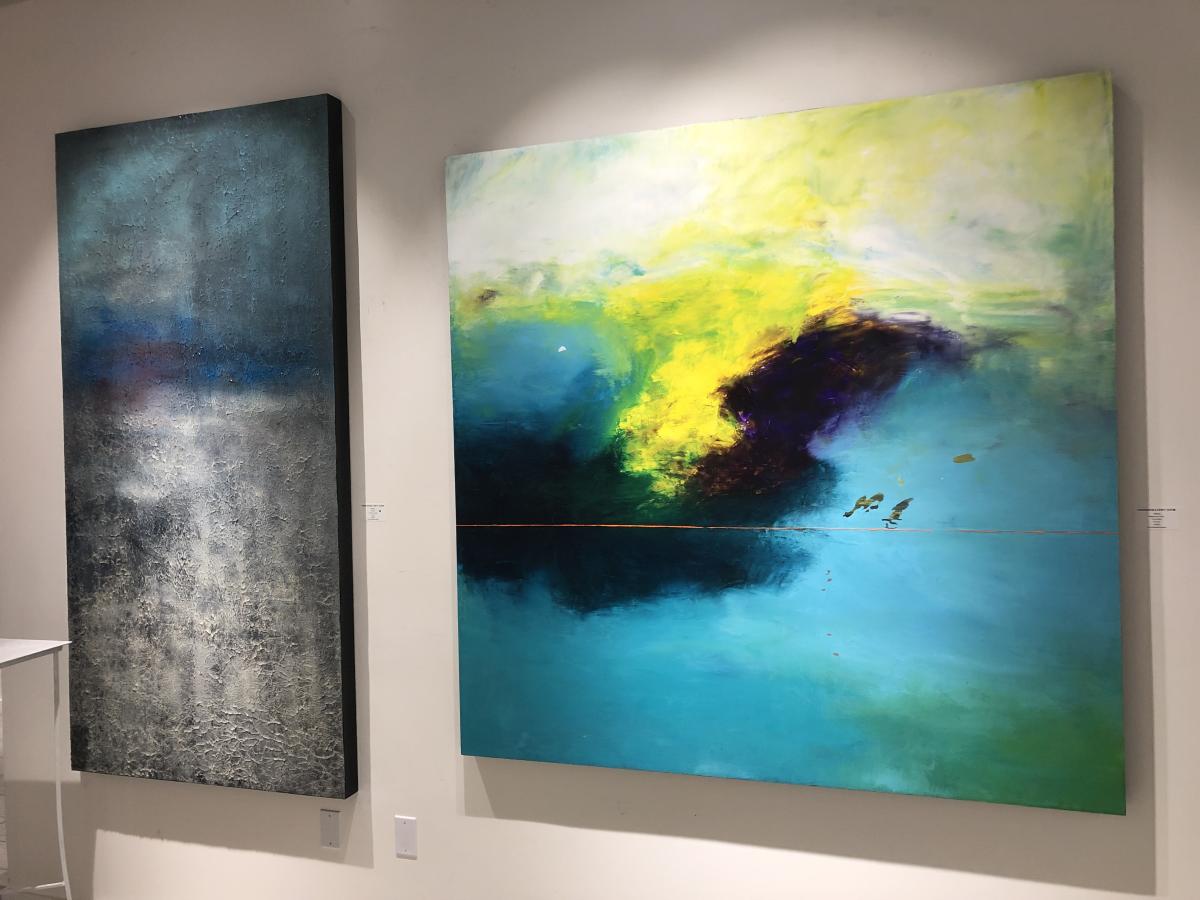 Two large abstract paintings by Esteban are displayed side by side on a wall at CODA Gallery in Palm Desert.