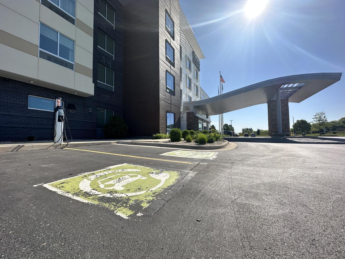 Image of an electric vehicle charging station located outside of the Fairfield Hotel in Pleasant Prairie, WI