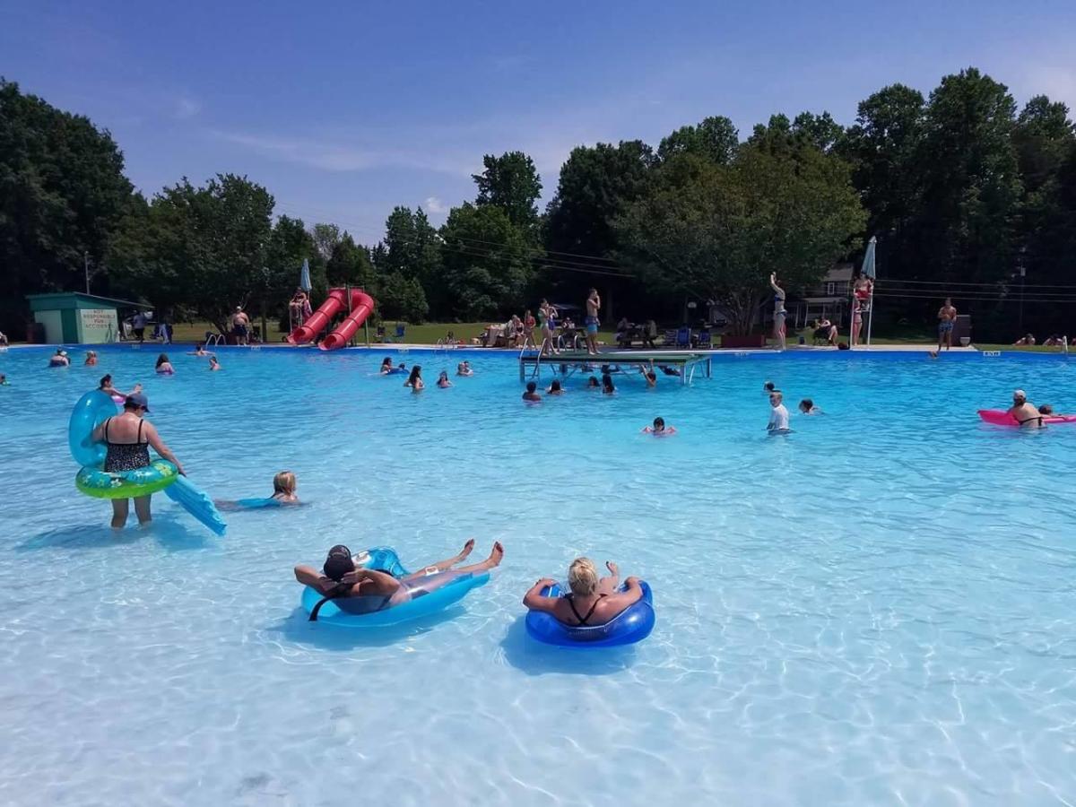 People flaoting and swimming in Blue Waters Pool