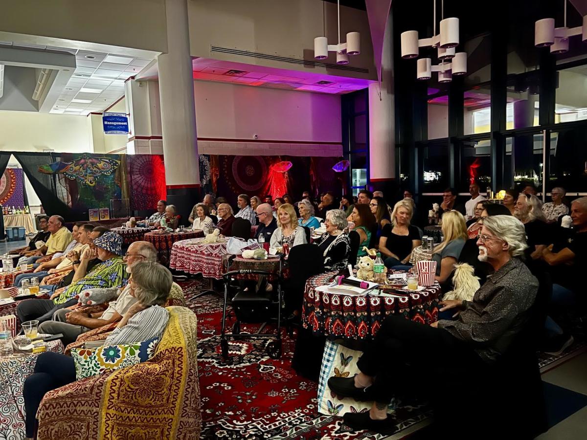 An audience for a concert in The Lobby Lounge at The Harbor Center, Slidell