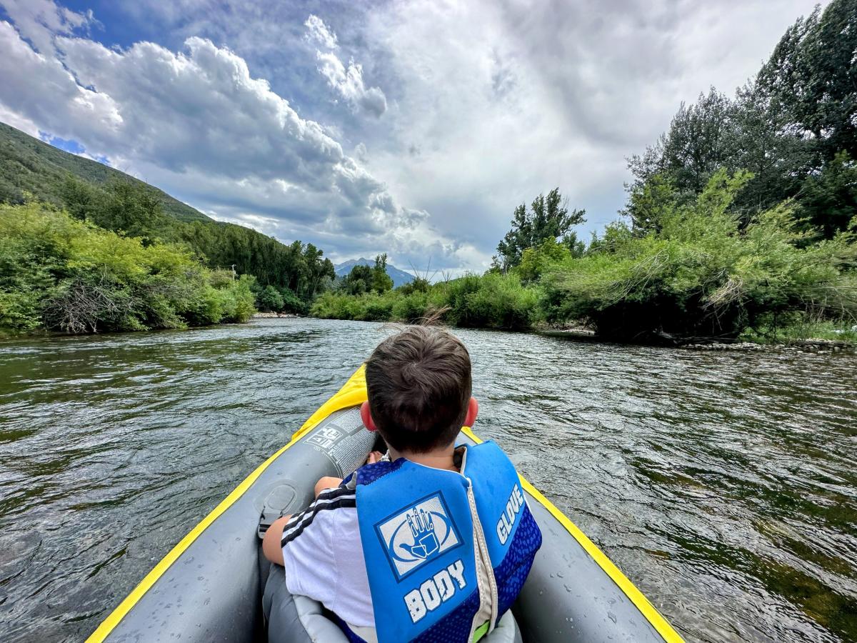 Boy on a tube on the Provo River
