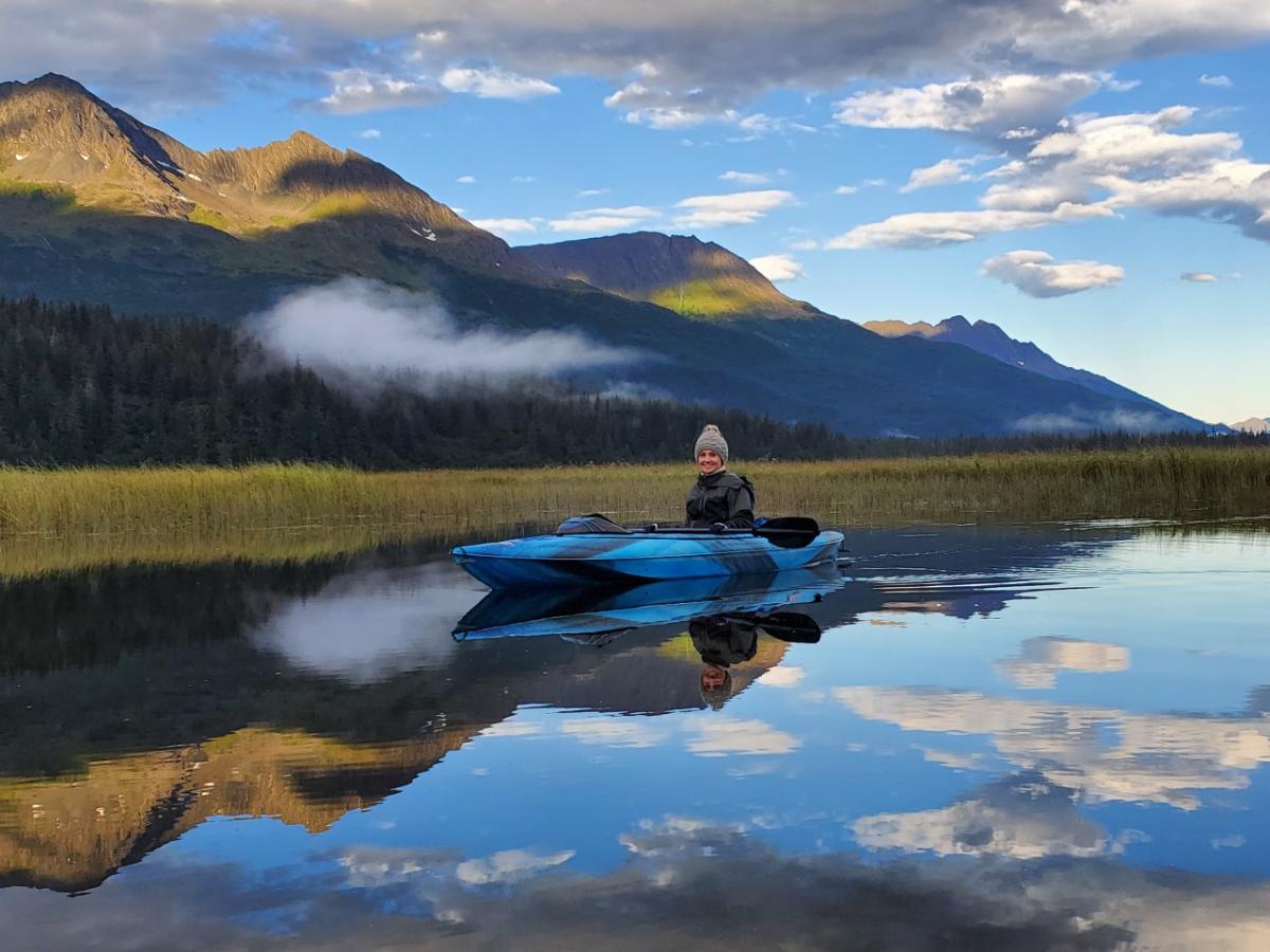 a kayaker on a lake