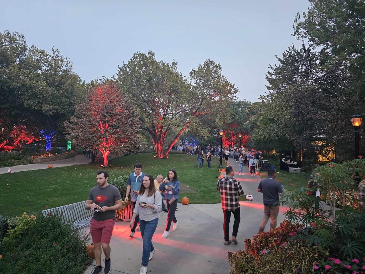 People stroll through the gardens at Botanica Wichita during the Haunted Hops event