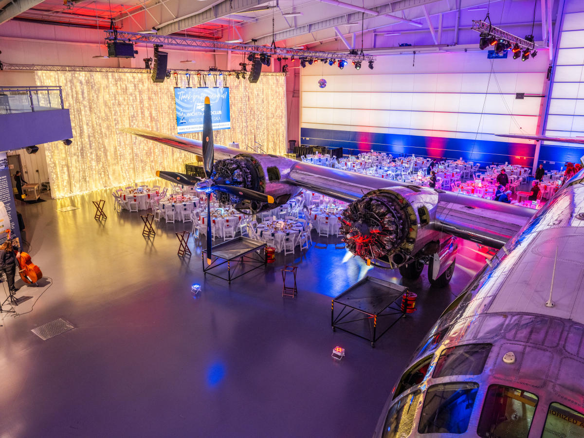 Tables are set up for the Wichita Aero Club Gala under B-29 Doc