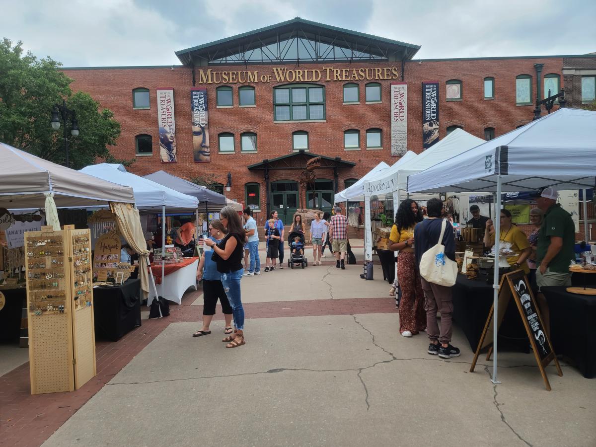Patrons browse goods at the Old Town Farmers Market
