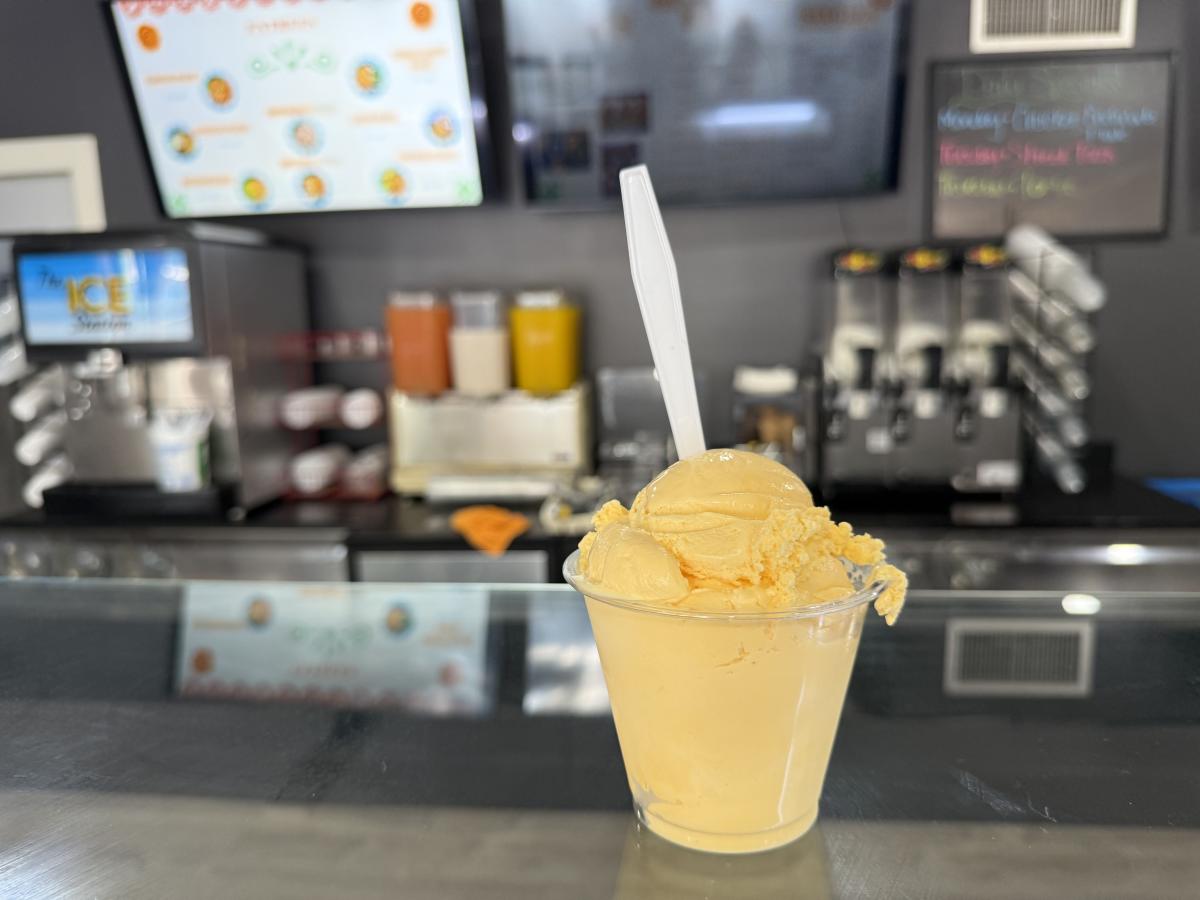 Mango ice cream is served in a cup at La Paleteria Reyna in Wichita