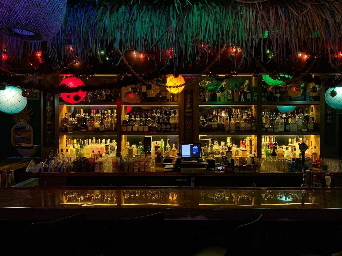 The bar at Lava and Tonic is lit up in colors of blue, pink, purple and green