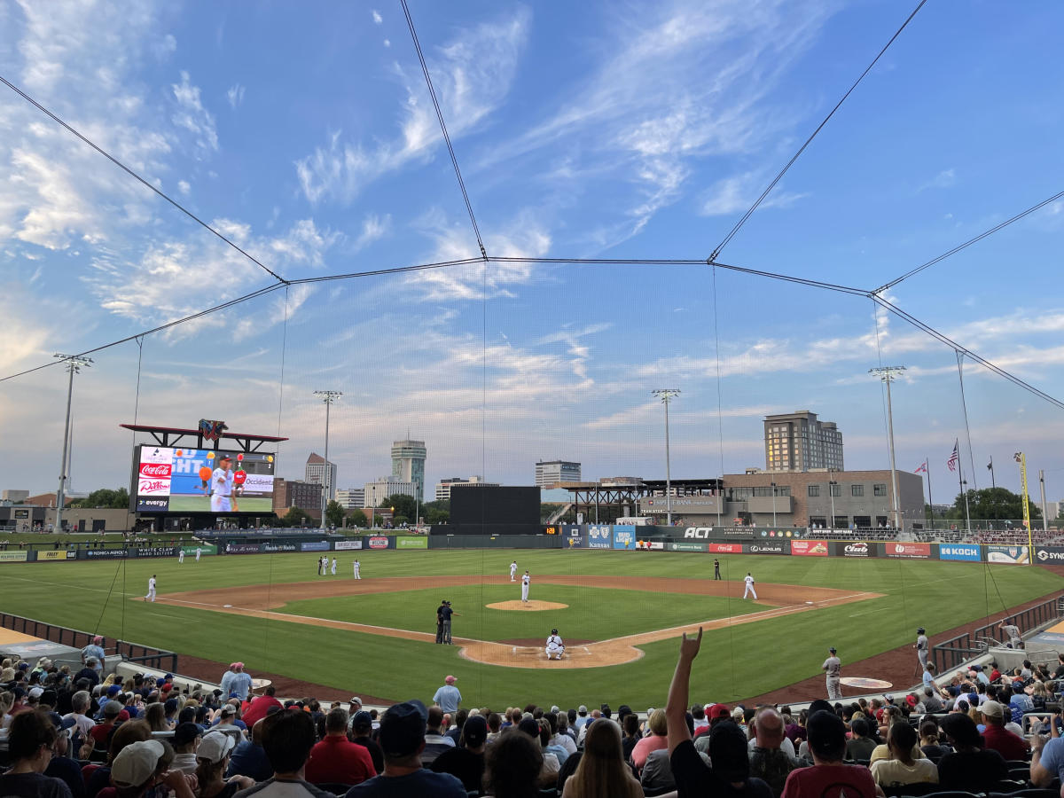 Wind Surge players take the field against an opposing team at Riverfront Stadium in downtown Wichita