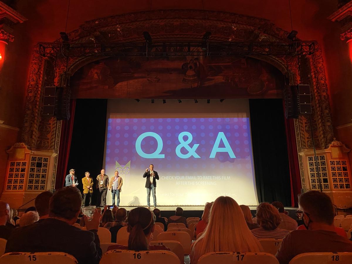 A man answers questions during a Q&A Session during Tallgrass Film Festival