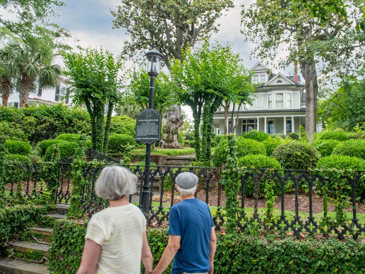 Couple walking through historic district in Wilmington
