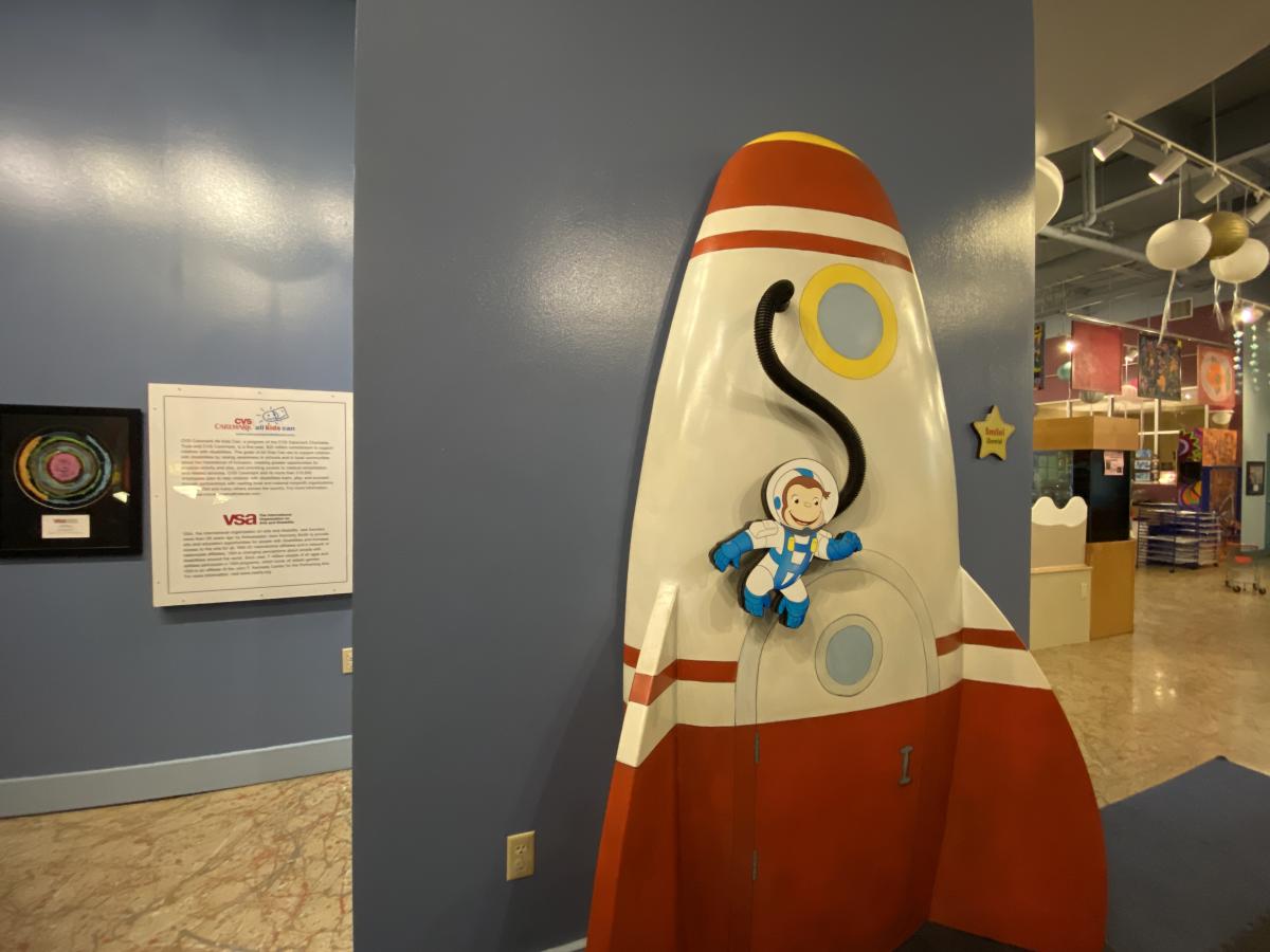 Curious George with Rocket Ship at The Woodlands Children's Musuem