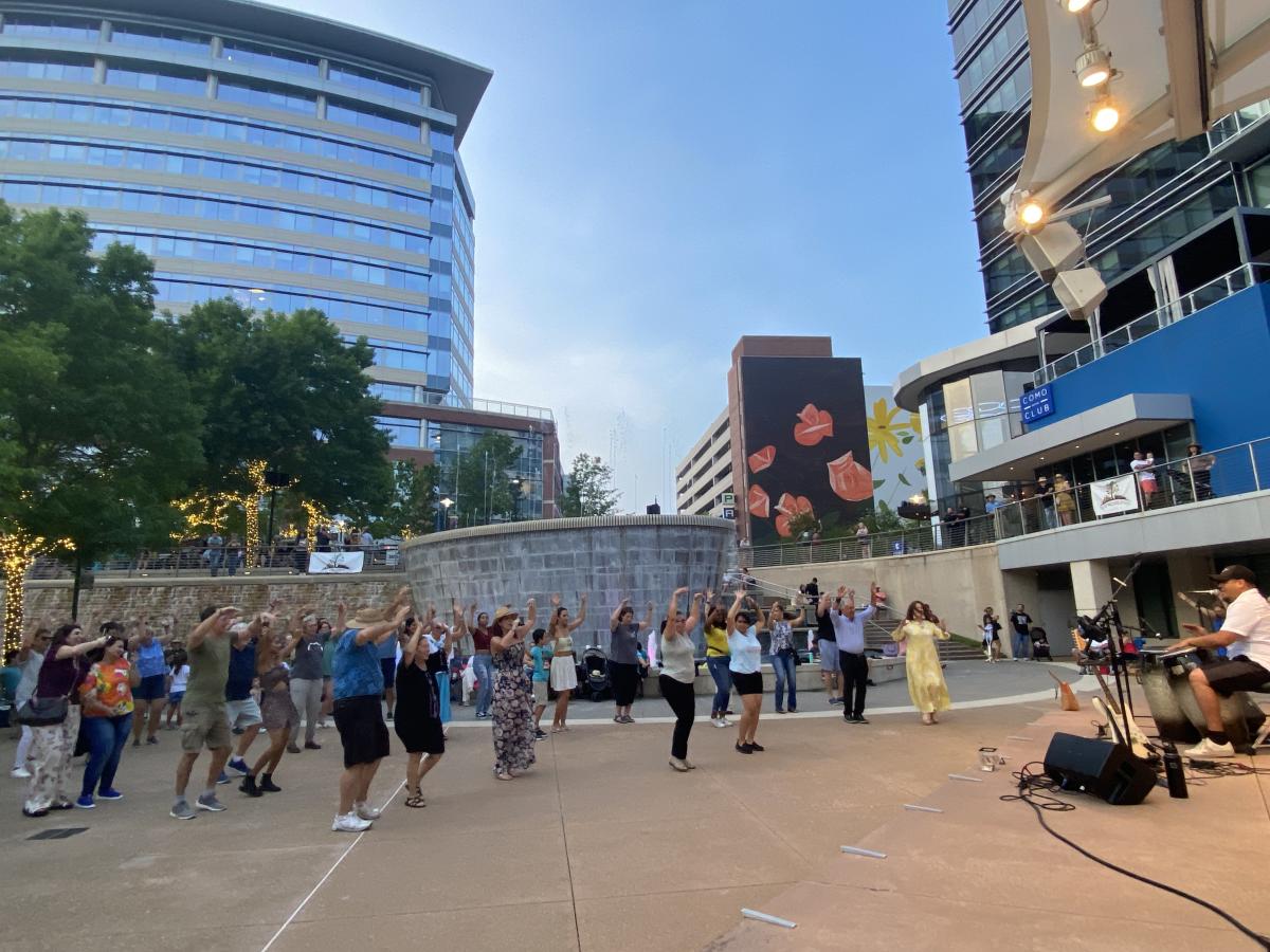 Guests dancing to music at the Waterway Nights Concert series