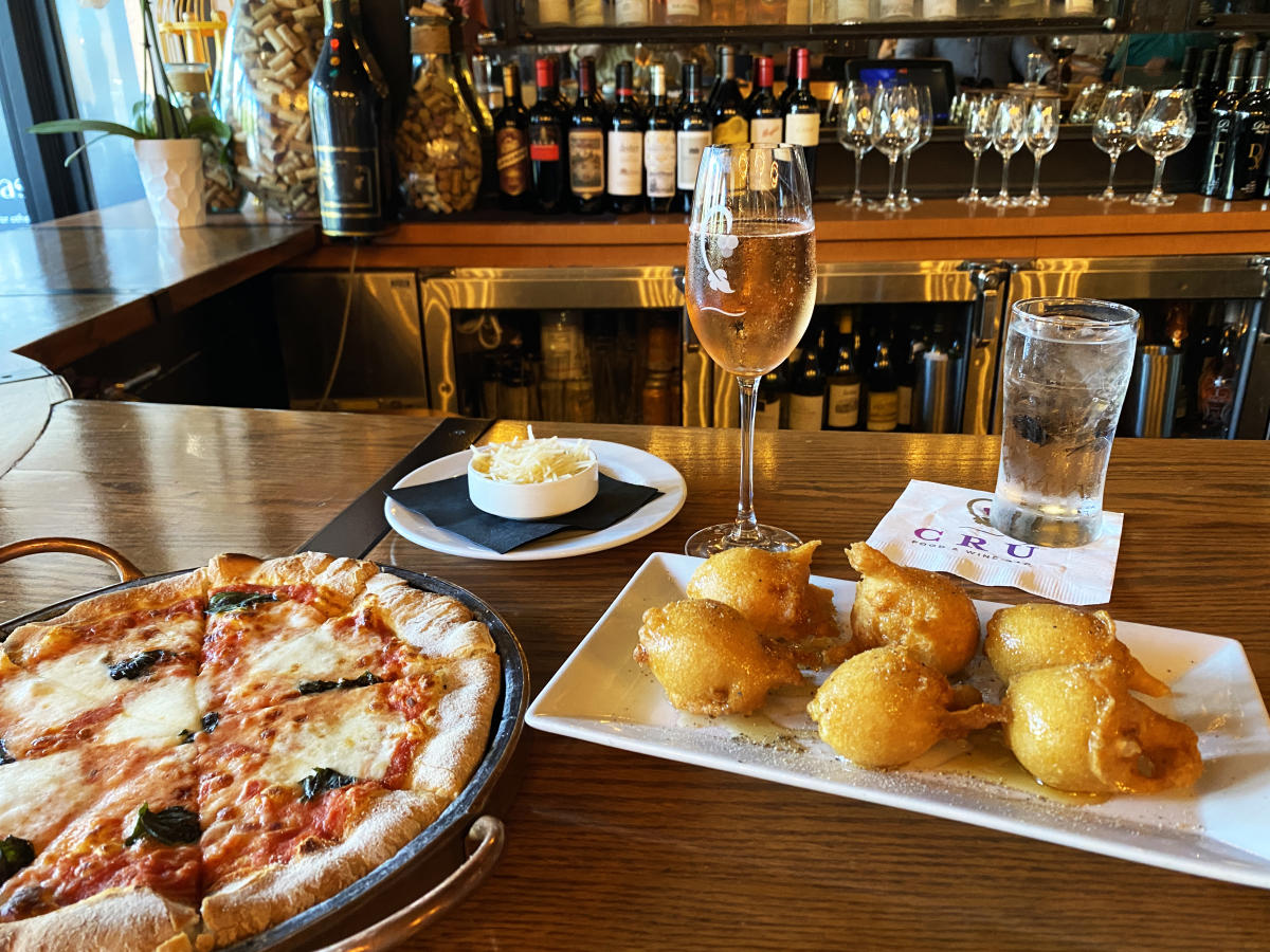 Happy Hour at CRU - Pizza and Goat Cheese Beignets