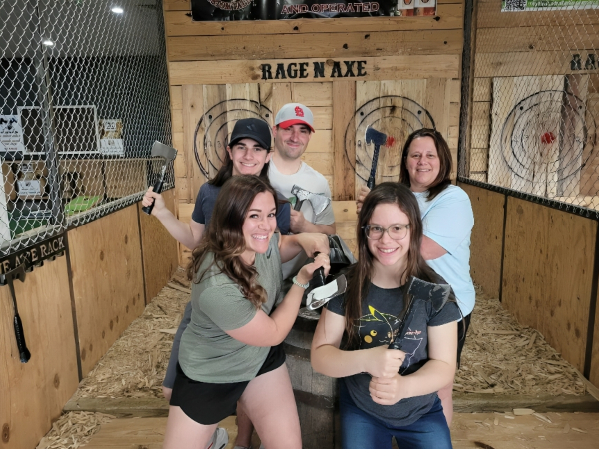 Family poses at Rage N' Axe