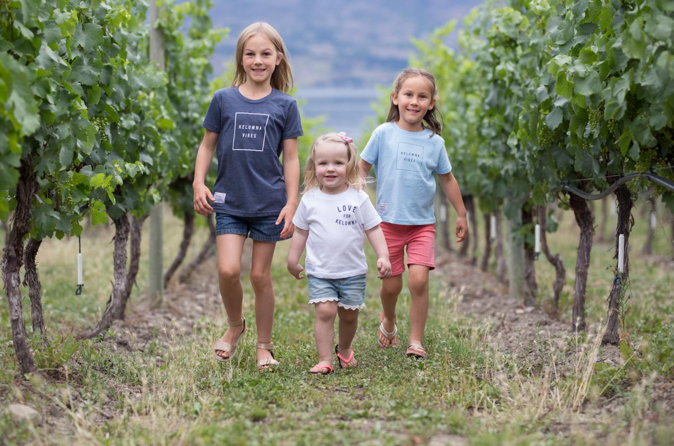 Kids wearing Love for Kelowna apparel in Vineyard