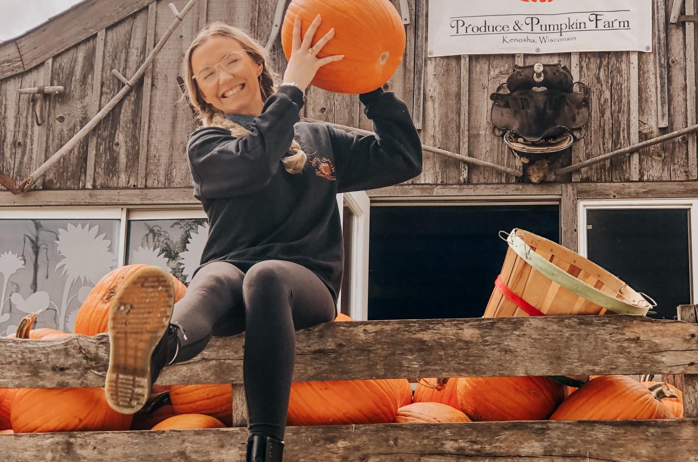 Jerry Smith girl holding pumpkin