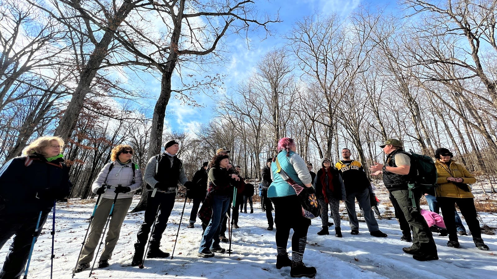 First Day Hike participants gather under blue skies