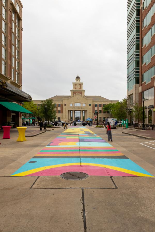 Pavement Mural in Sugar Land Town Square painted by Shelbi Nicole Designs