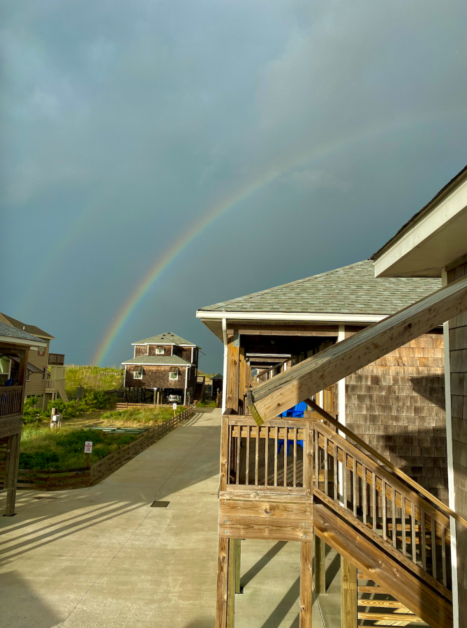 A rainbow over beach front rental homes