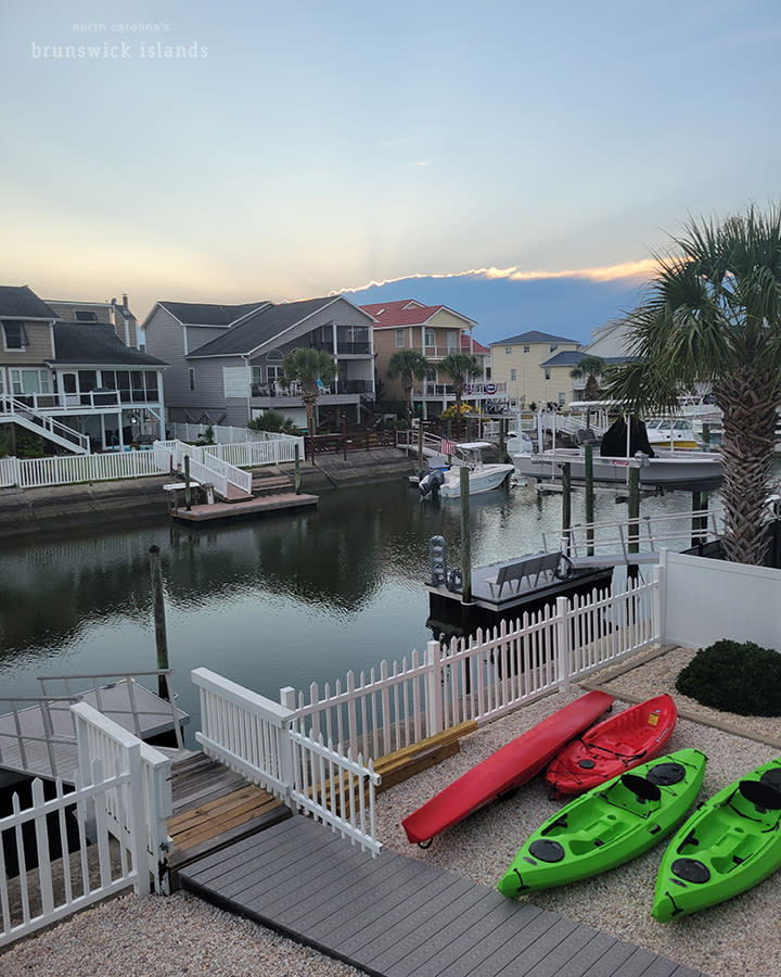 a view of a canal on Ocean Isle Beah from the top deck of a house