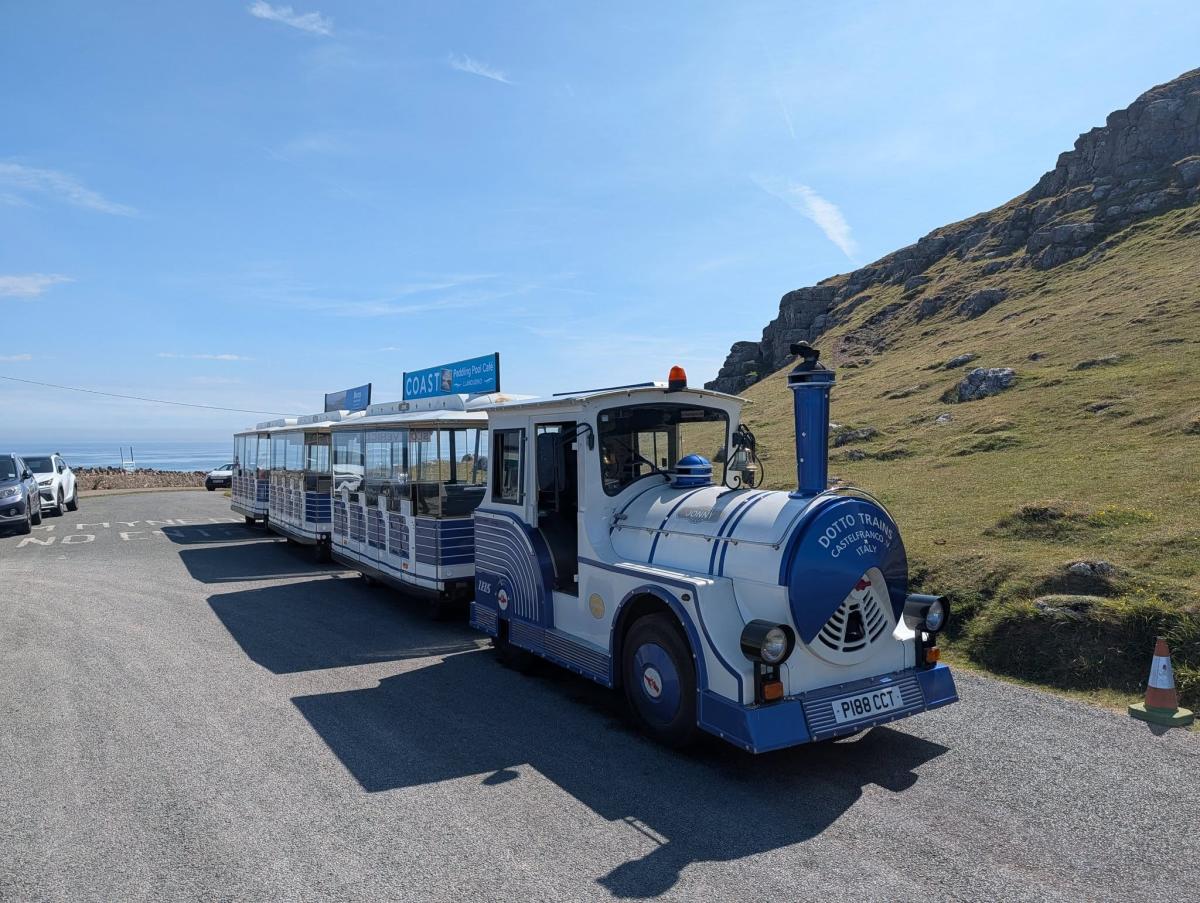 Land train in blue and white on the Marine Drive, Great orme, Llandudno