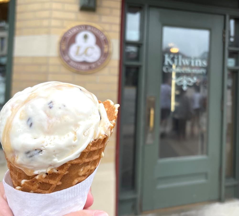 Ice cream cone in front of Kilwins Ice Cream store