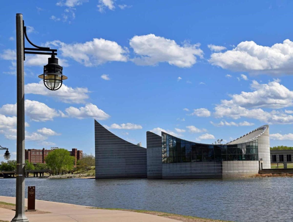 Exploration Place is photographed on a sunny days with clouds popping against the bright blue sky