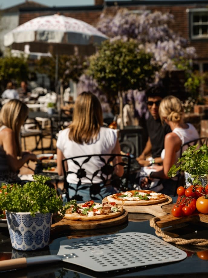 Pizza in the garden at Stanwell House