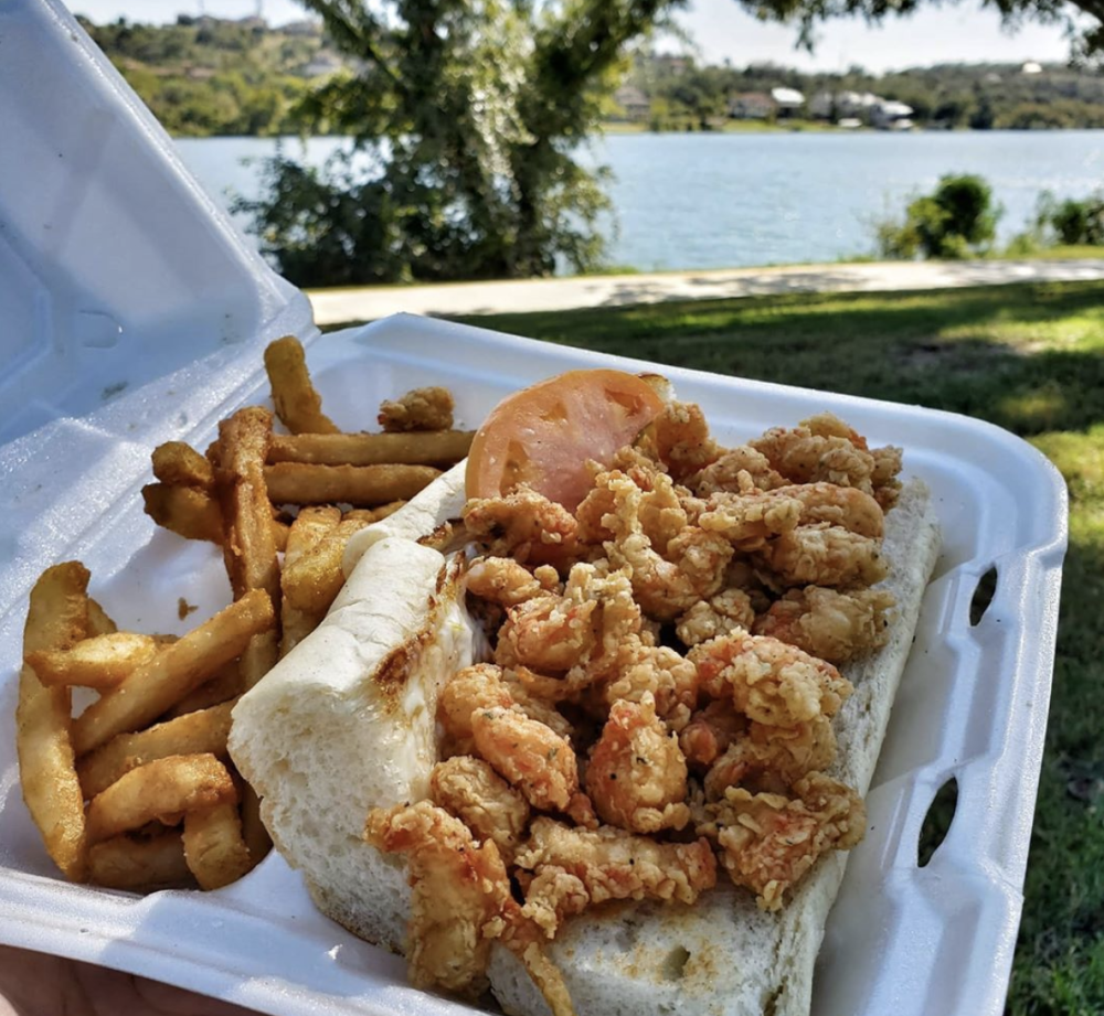 Po Boy and fries in to go container in Marble Falls Texas