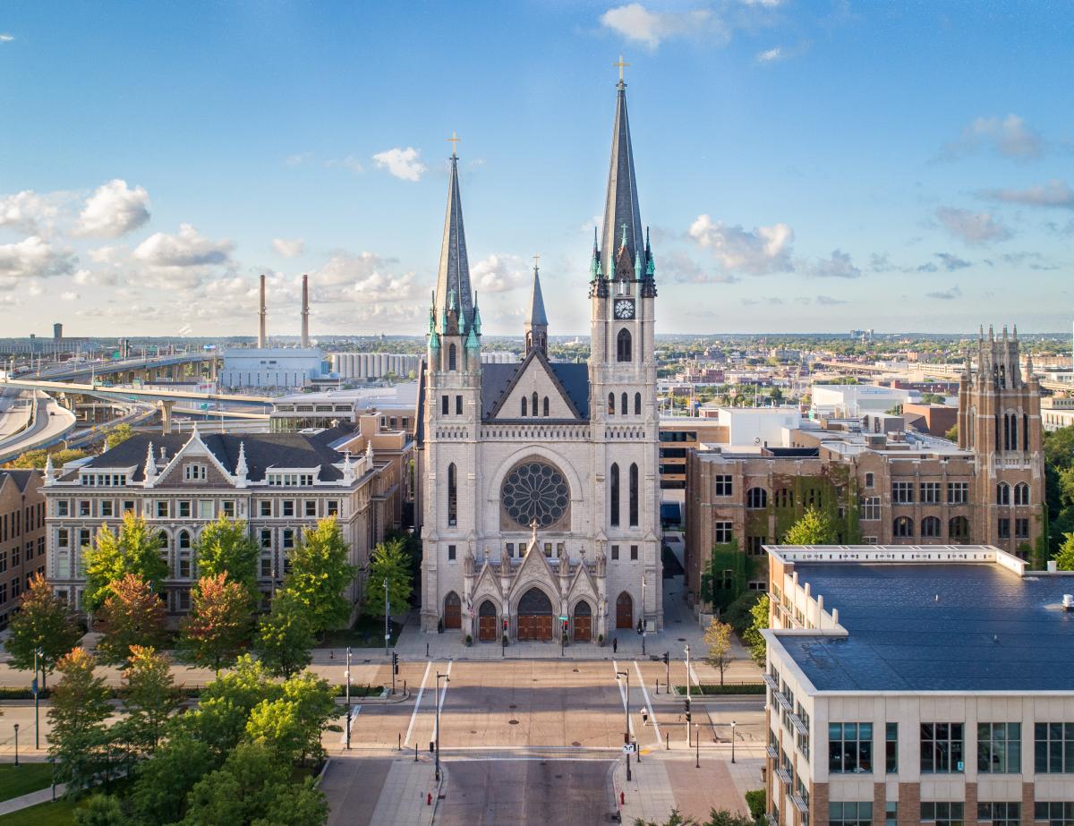 drone photo of Gesu Church on the Marquette University campus