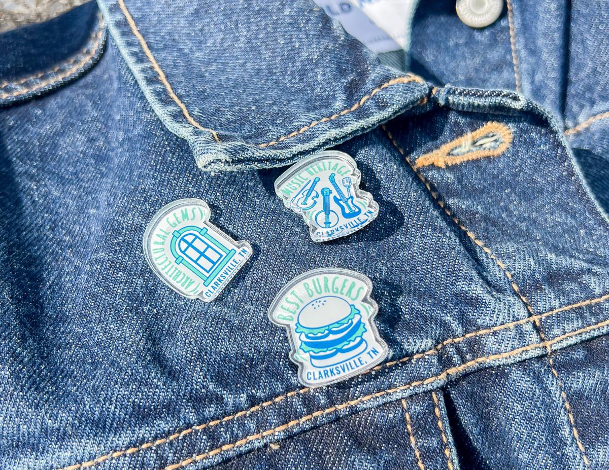 denim jacket with three collectible pins