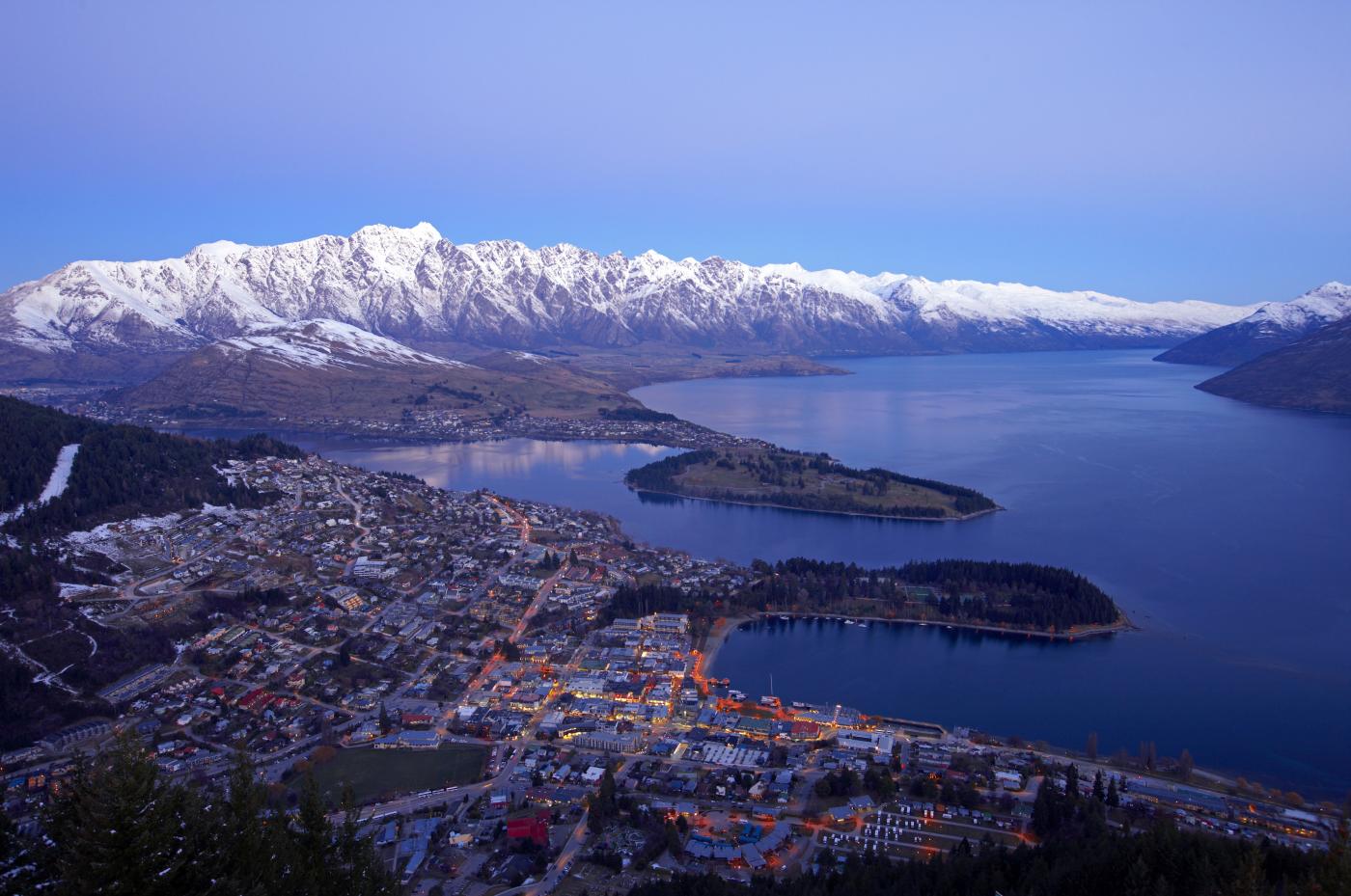 Aerial view of Queenstown looking at the town, lake and The Remarkables