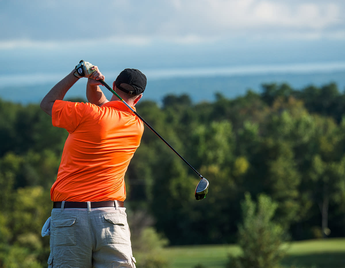 Man golfing at Woodcrest Golf Club