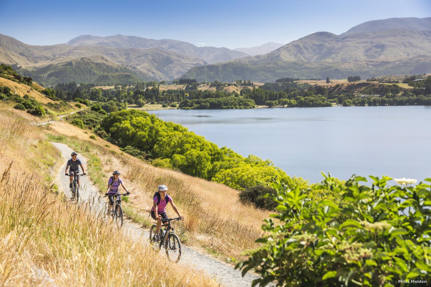 Friends Biking Around Lake Hayes in Summer