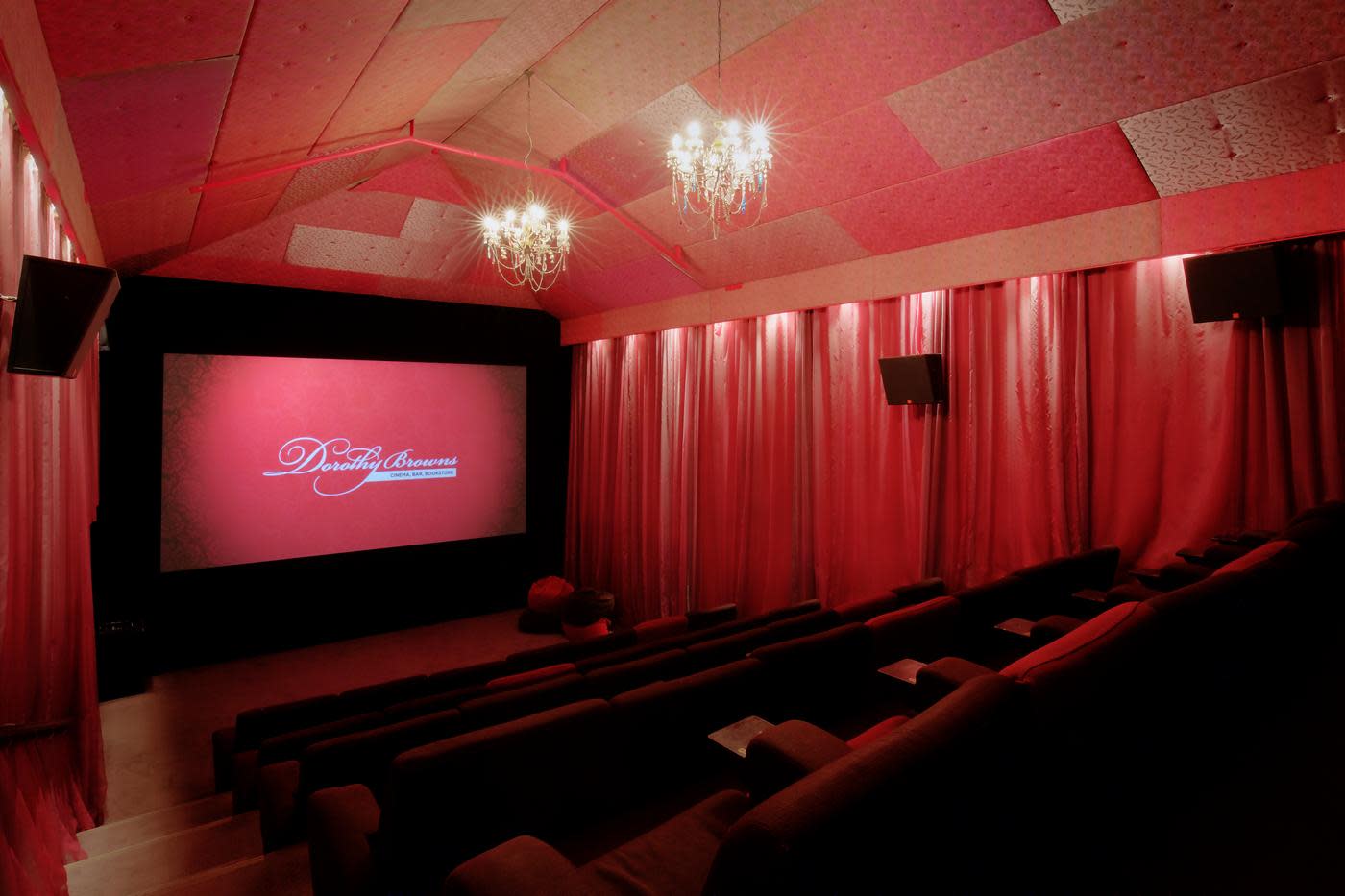 Inside Dorothy Browns Cinema with lush red interior and large comfortable seats, Arrowtown